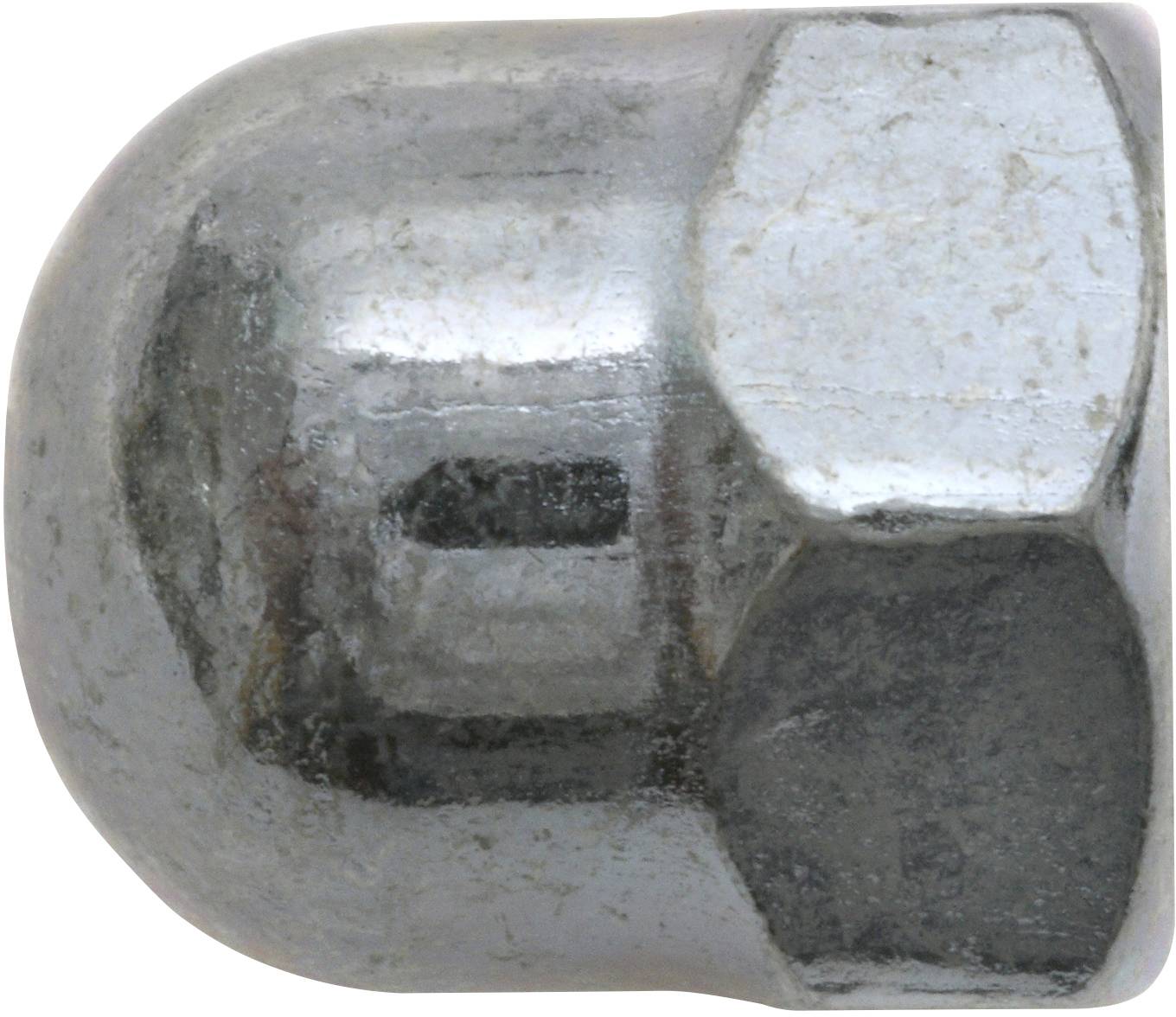 Metal hexagonal screw cap with a smooth, curved surface; likely for mechanical or industrial applications.