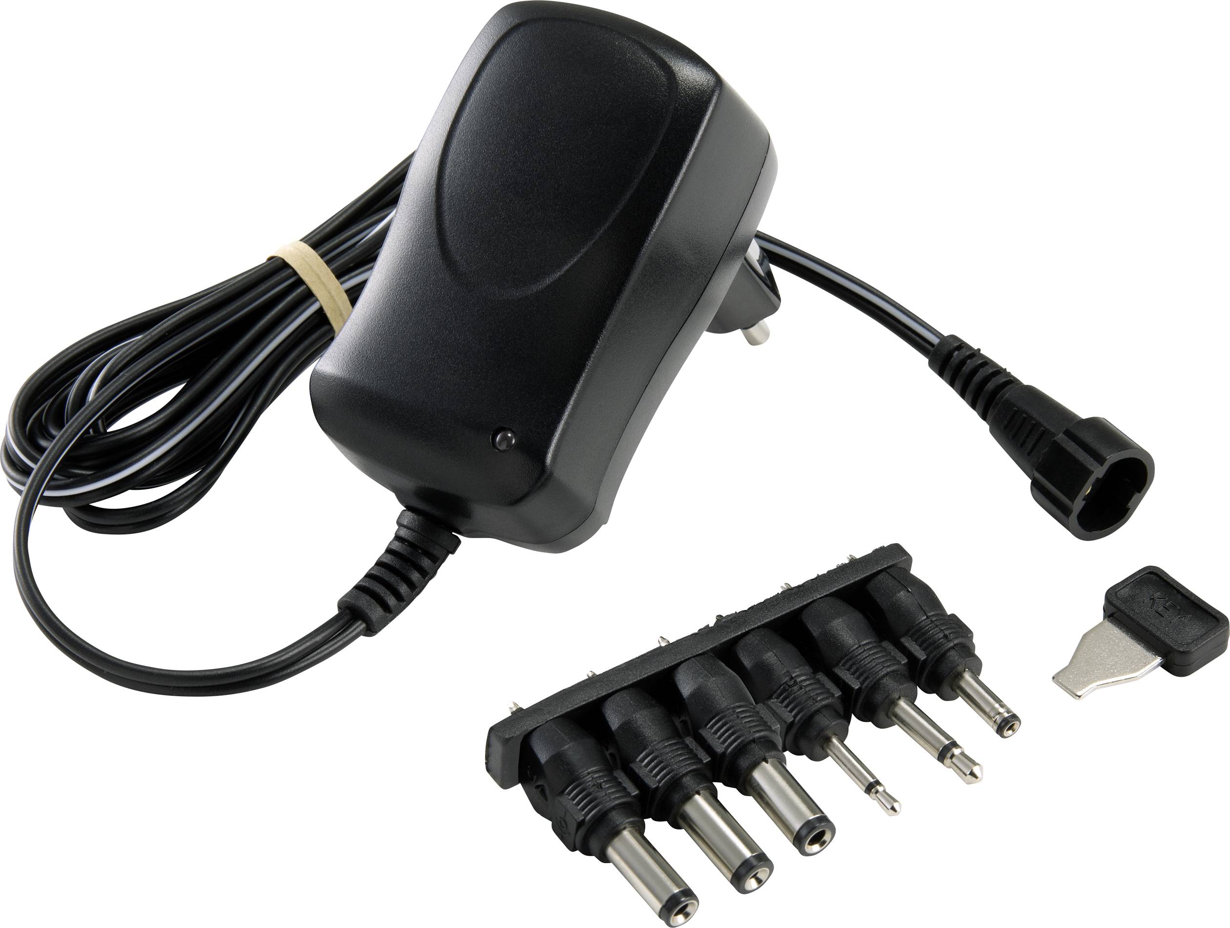 Black power supply with multiple plug adapters, cable and small tool for adapting to different device connections.