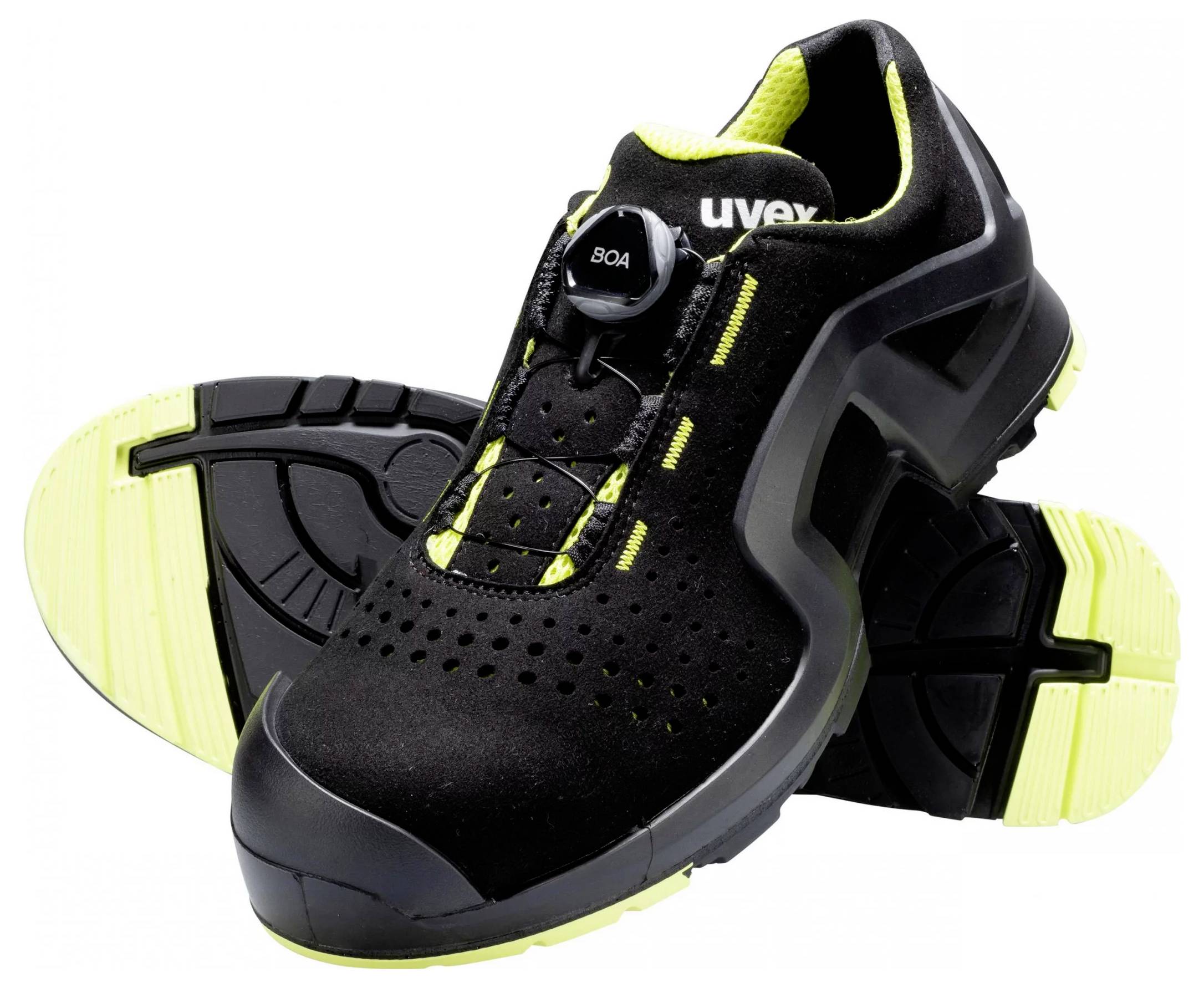 A pair of black safety shoes with yellow accents and a Boa closure. Robust and designed for occupational safety.
