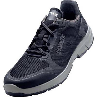 Black safety shoe with grey sole and 'uvex' logo on the side, suitable for industrial work environments.