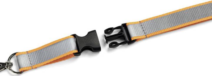 The image shows a partially opened lanyard with a black security clasp in the centre and orange-grey straps.