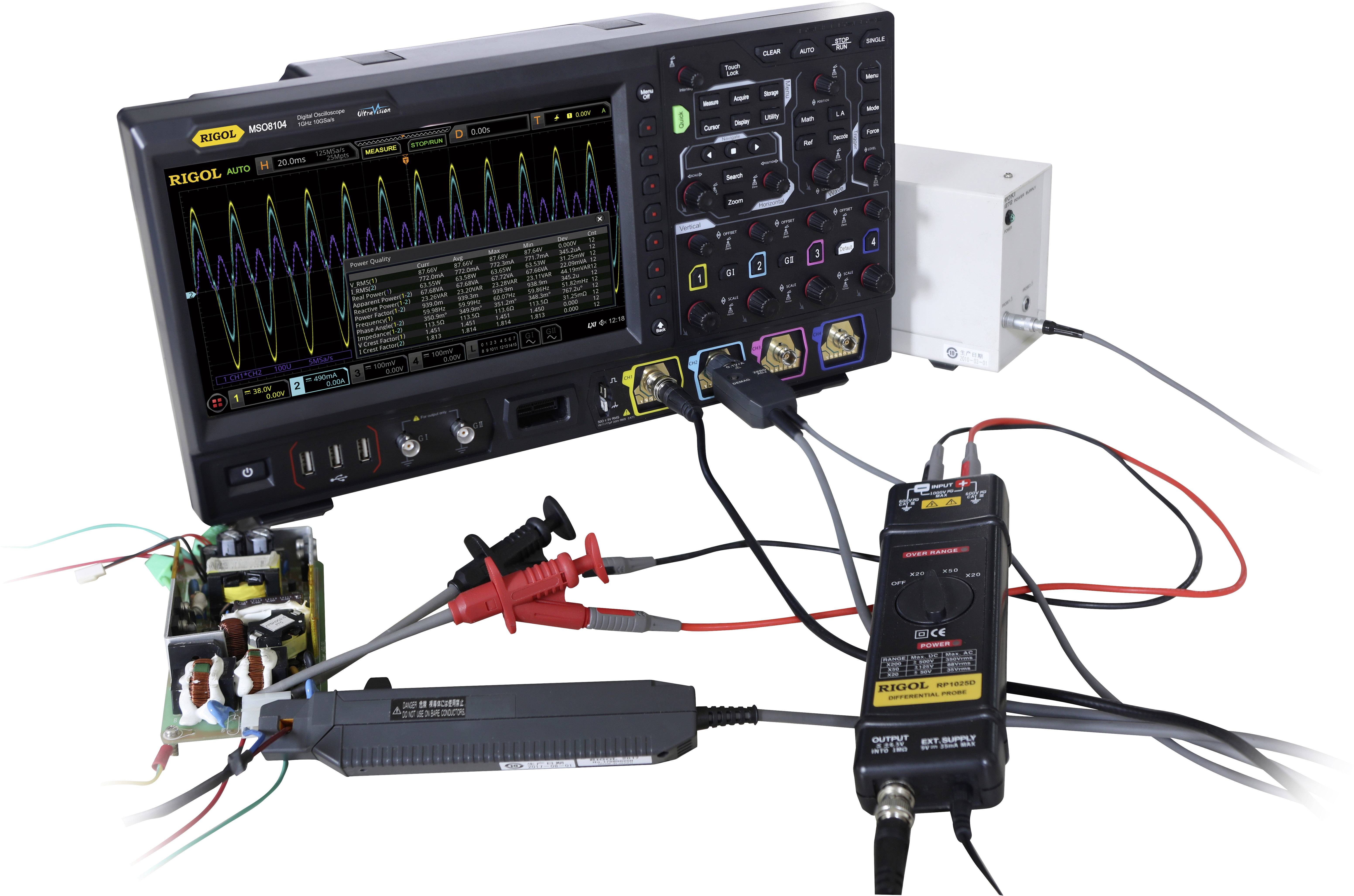 An oscilloscope displays waveforms on the screen. It is connected to multiple cables and electronic measuring instruments.