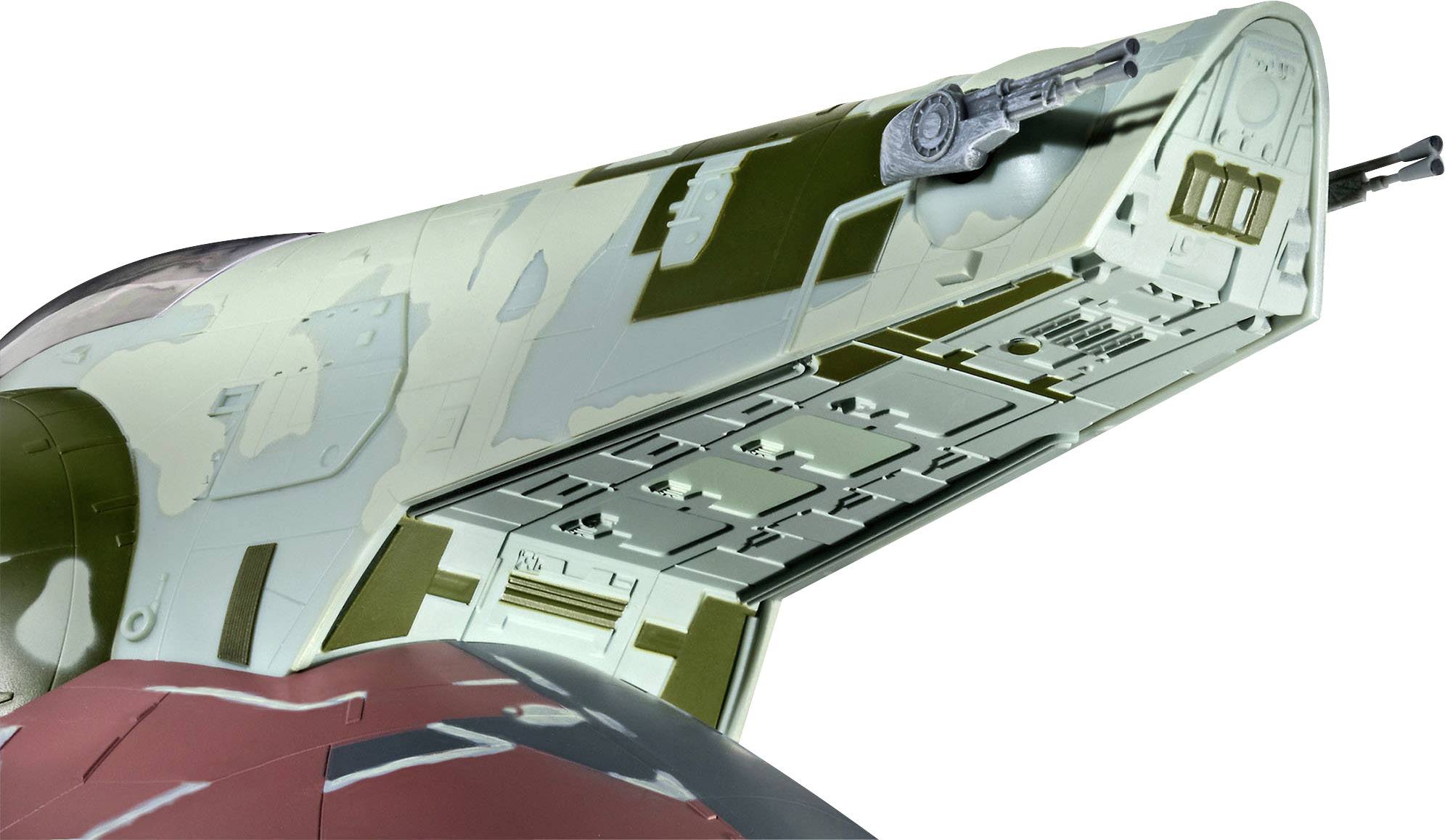 A spacecraft with camouflage pattern, with its side hatch open, reveals detailed views of the internal structure.