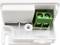 Electrical connection with a green terminal block in a white housing, suitable for wire securing and safe electrical installation.