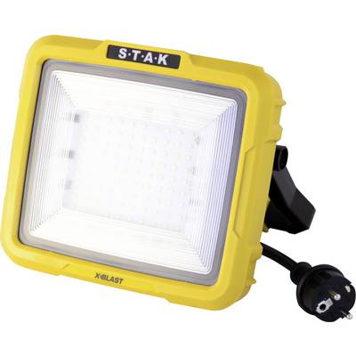 A rectangular, yellow LED work light with power cable. The light has the inscription 'S-T-A-K' at the top and 'XBlast' at the bottom.