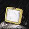 'Wet yellow construction spotlight in the rain on wet ground, with a plug on the side.'