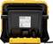 A yellow, portable work light in a robust housing with an electrical connection cable, rear view.