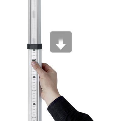 A hand is holding a measuring stick, with an arrow pointing downwards.