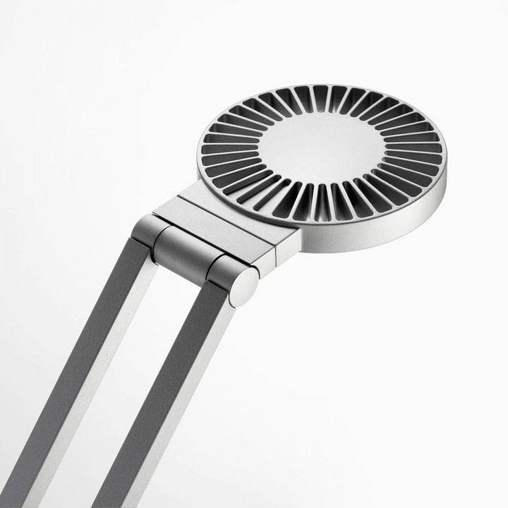 Grey, round desk fan design with a slim, adjustable arm in a minimalist style against a white background.