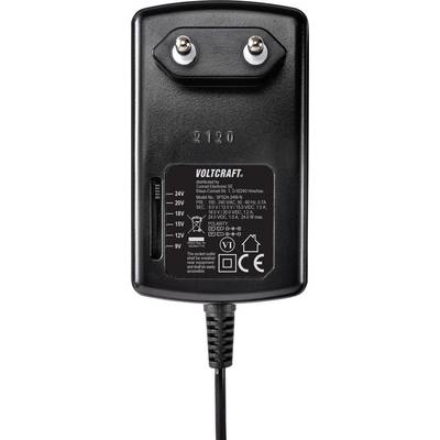 Black power supply by Voltcraft with adjustable voltages from 9V to 24V, two metal pins and a label with technical details.