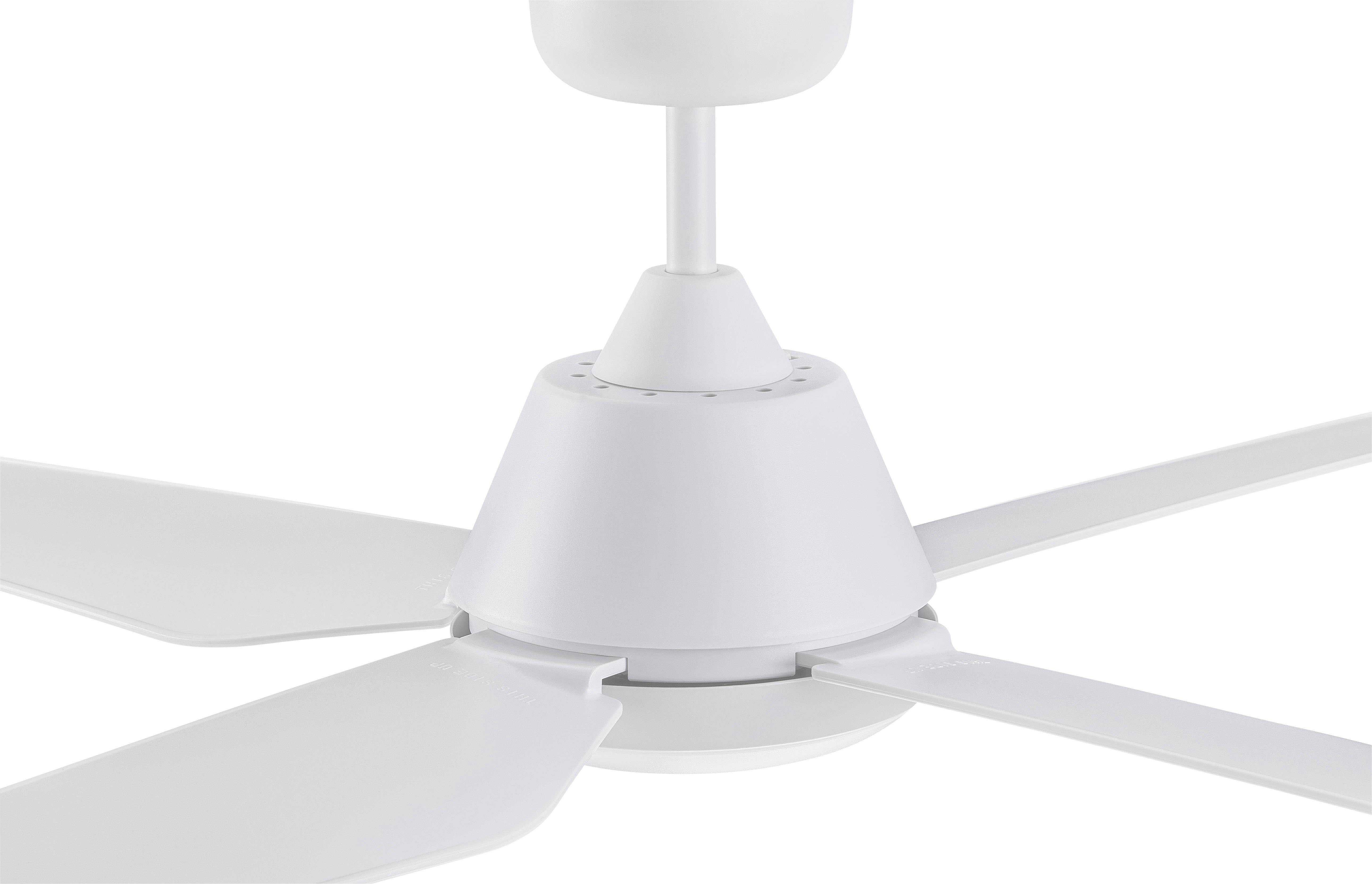A white ceiling fan with four blades in close-up, mounted on the ceiling.