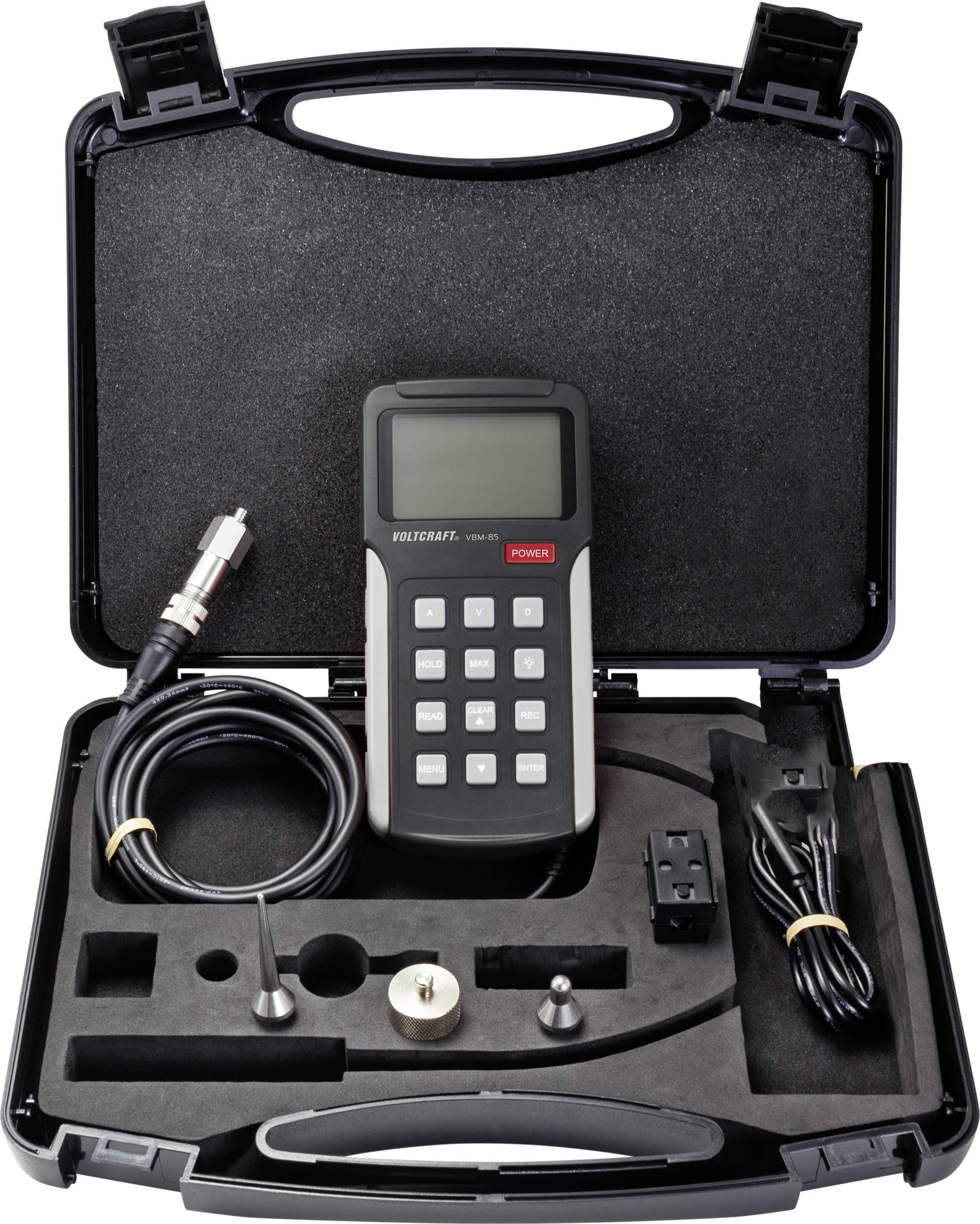 A case containing a measuring instrument, cables, and accessories. The device has a display and a keypad. It is designed for precise measurements.