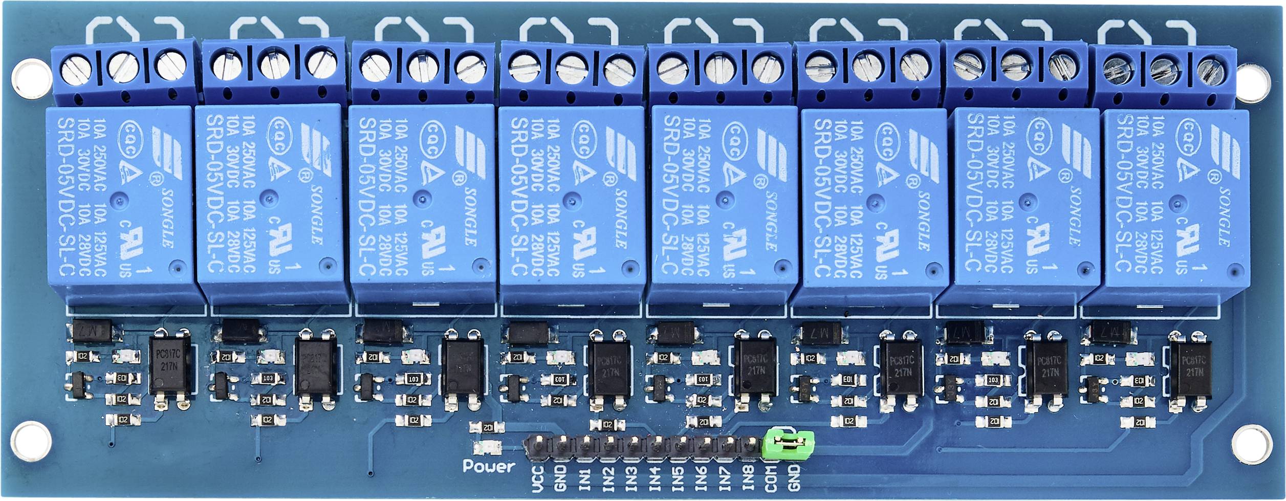 A blue relay PCB with eight channels, each fitted with blue relay modules, featuring black electronic components and pins for connections.