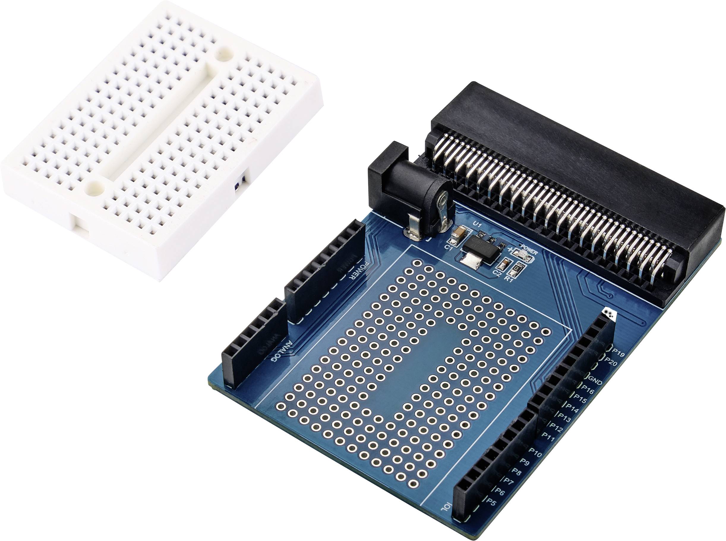 'Breadboard and expansion board with pins and connectors, for use in electronics projects and prototype development.'
