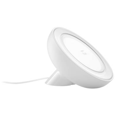 White, round table lamp with tilt mechanism, power cable visibly plugged in.