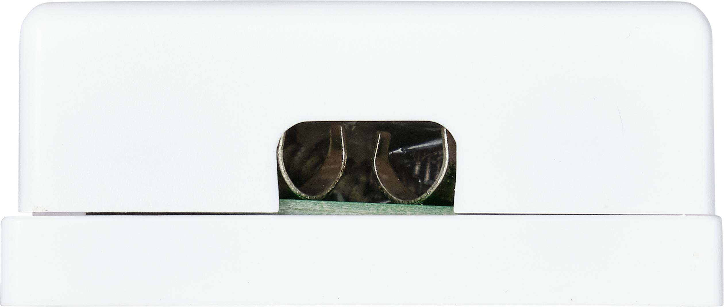 A white, rectangular plug with metal contacts in the centre.