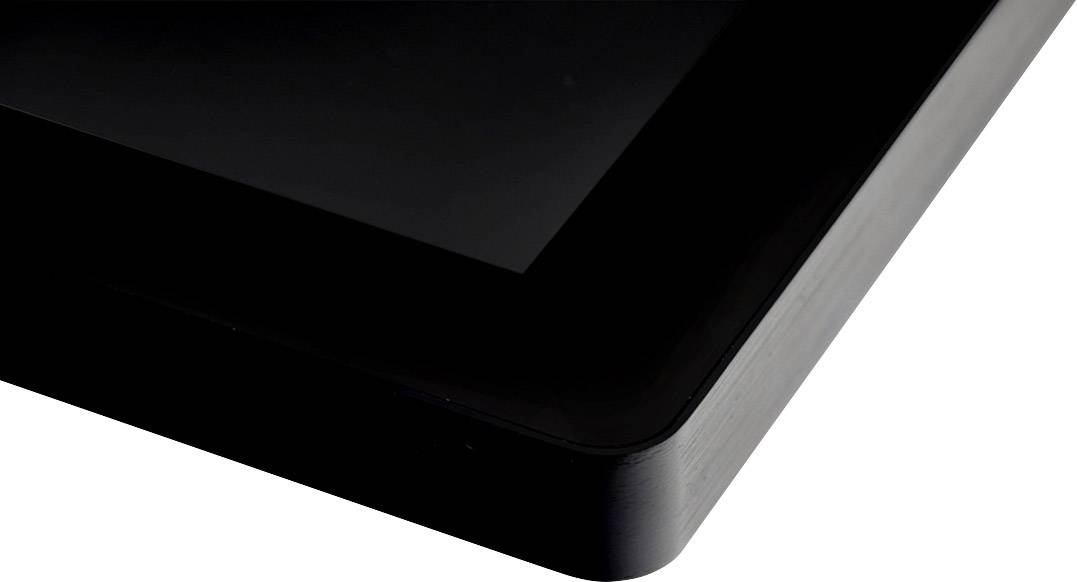 A black, glossy corner of an electronic device, likely a screen or tablet, in close-up.