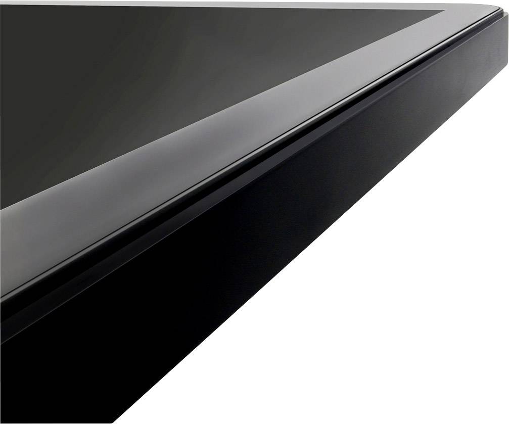 Close-up of a glossy black edge of an electronic device, possibly a screen or tablet.