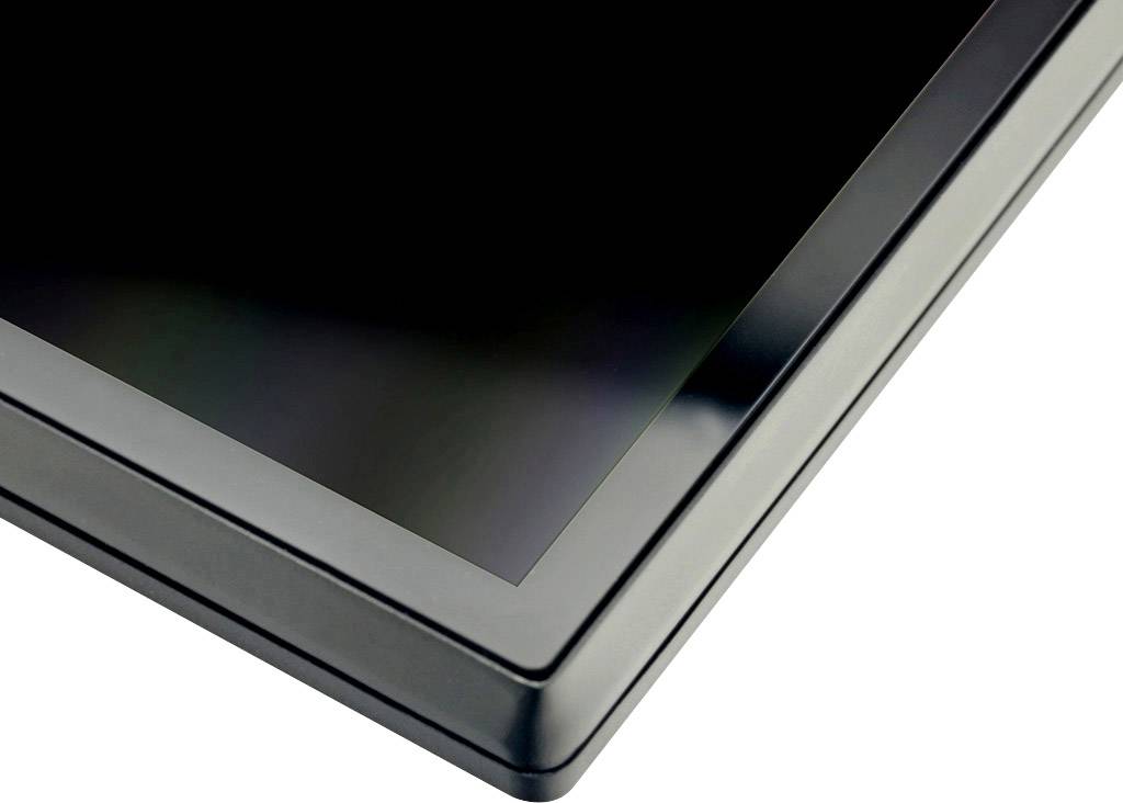 Corner of a black table with a glossy, smooth surface reflecting light.