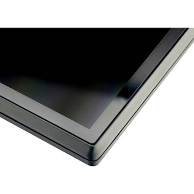 Corner of a black table with a glossy, smooth surface reflecting light.