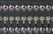 Several coaxial cables are connected to a row of BNC sockets. The top row has no cables connected.