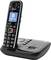 A black cordless telephone with base station, display showing 'Bluetooth'. Buttons clearly marked, suitable for home use.