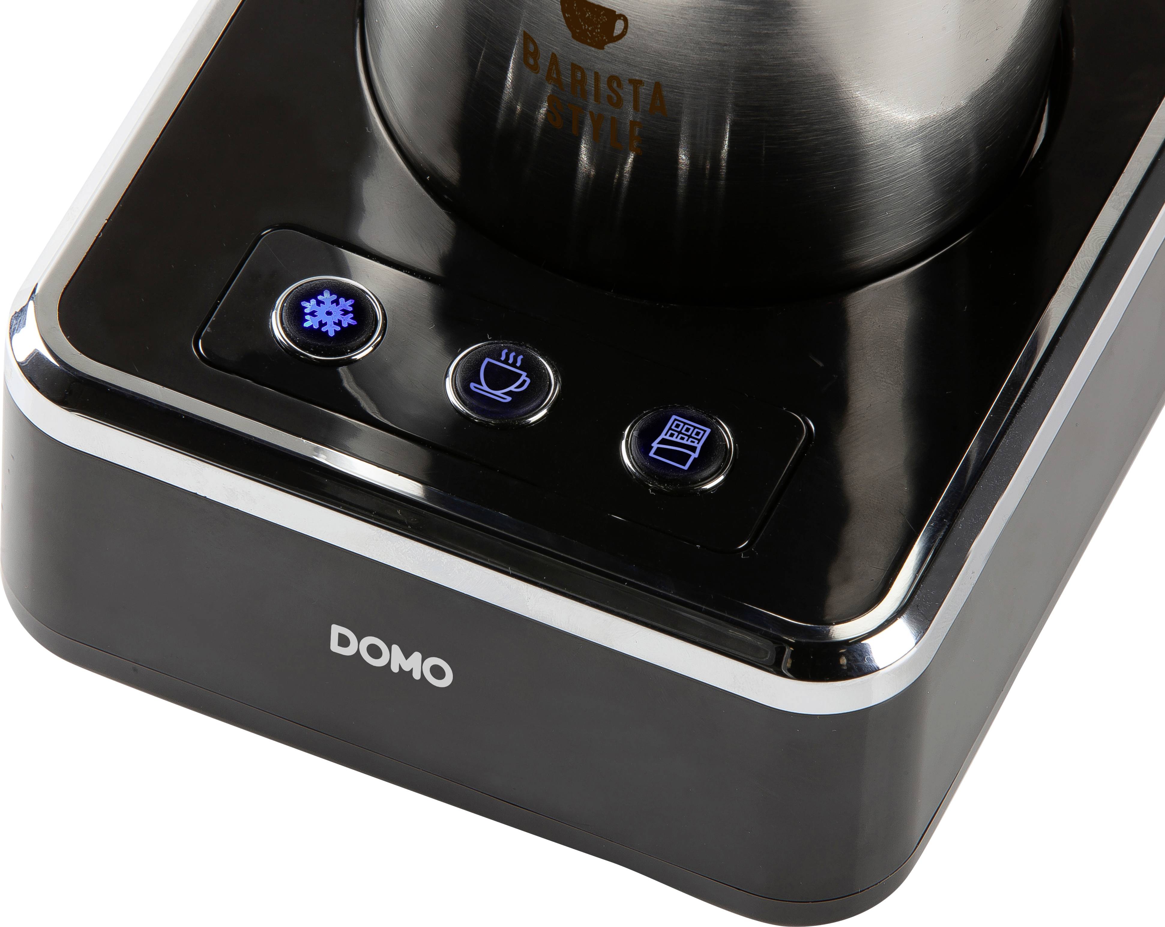 Coffee machine control panel with three buttons: icon for cooling, cup, and water container cleaning. Device by the brand Domo.