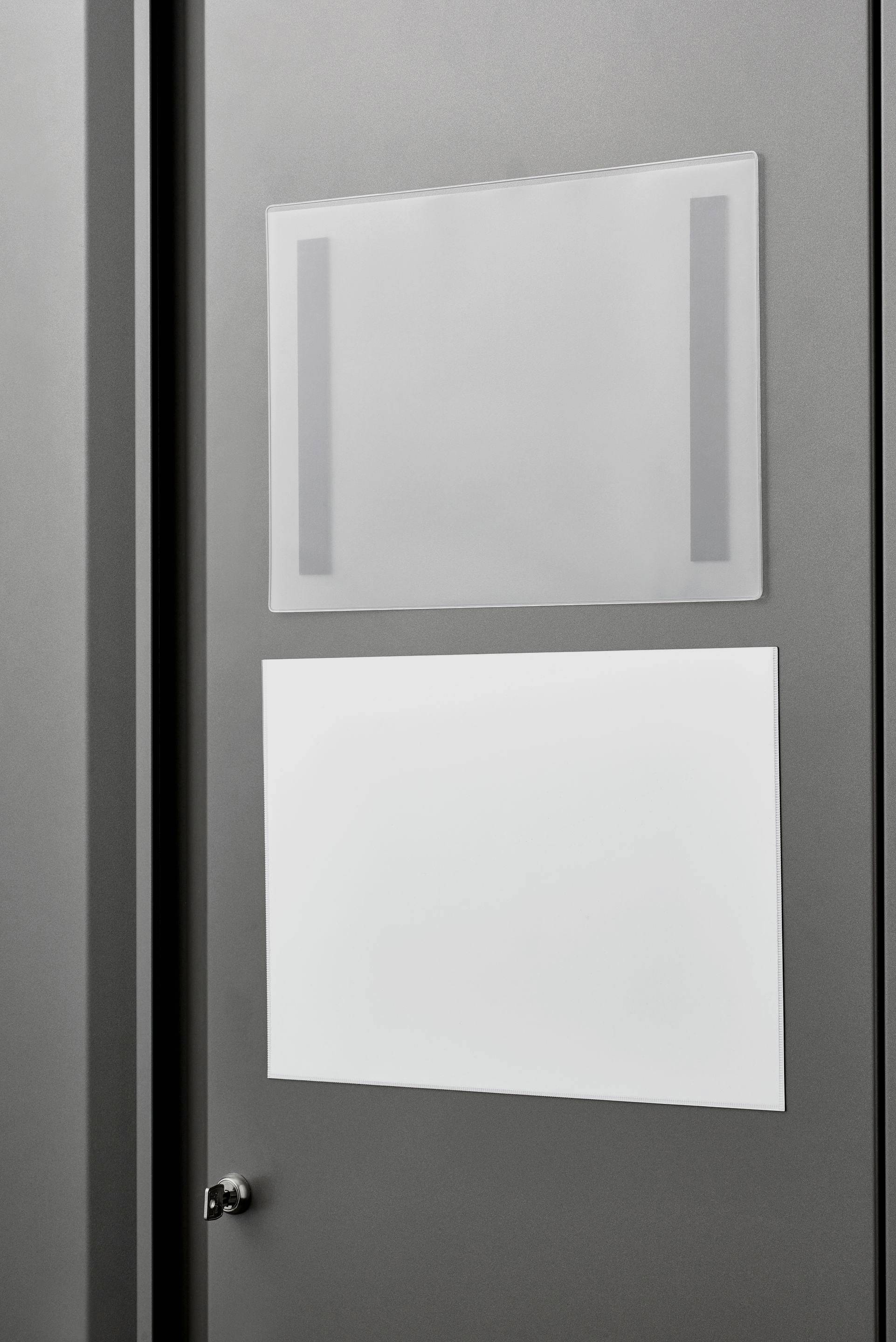 Two empty frames on a grey wall, one at the top transparent with grey bars, the lower one white. They are without content or labelling.