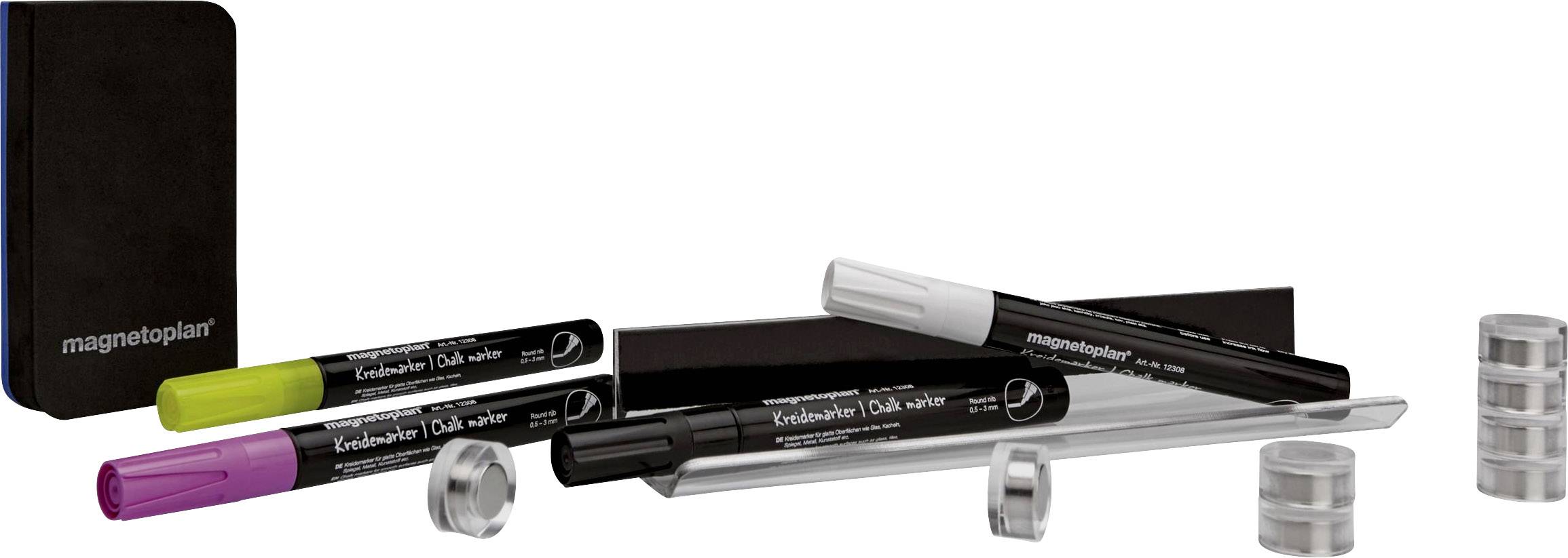 A collection of coloured whiteboard markers, a black eraser and round magnets lying on a white surface.