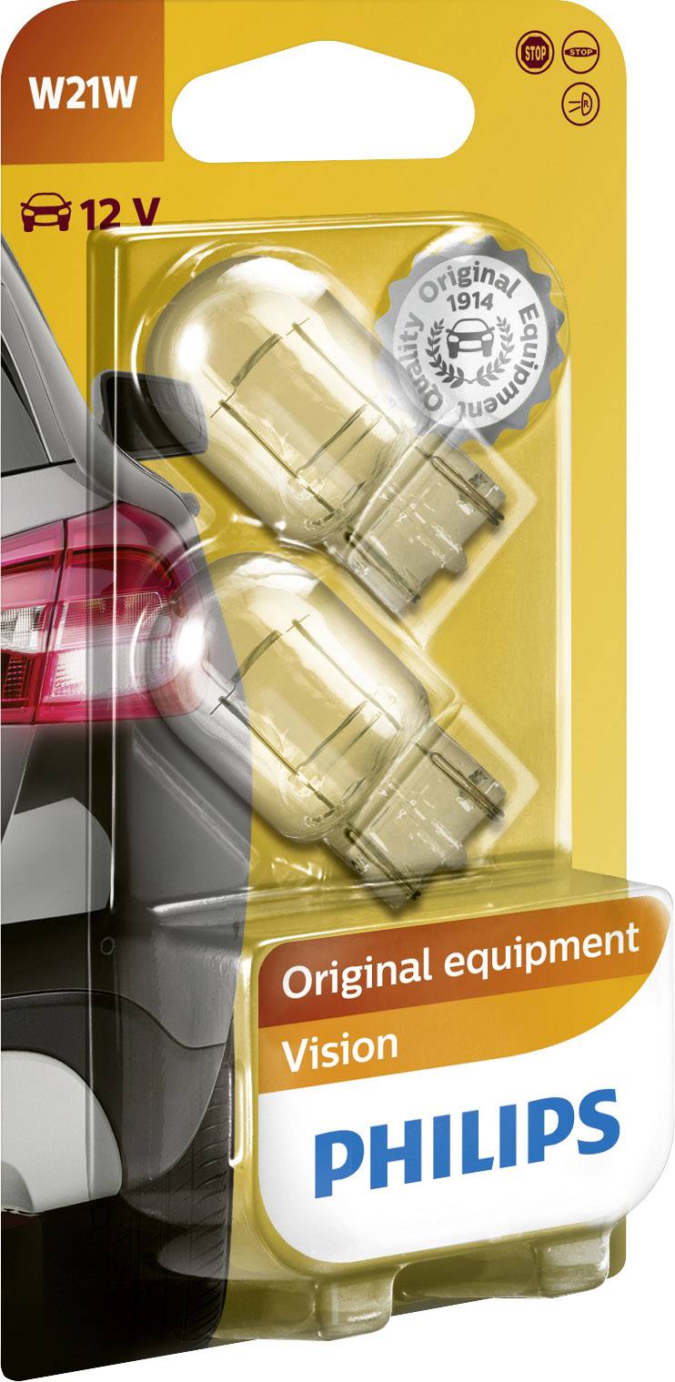 Packaging of two Philips W21W car bulbs, 12 volts, highlighted as 'Original equipment Vision' in front of a car rear.