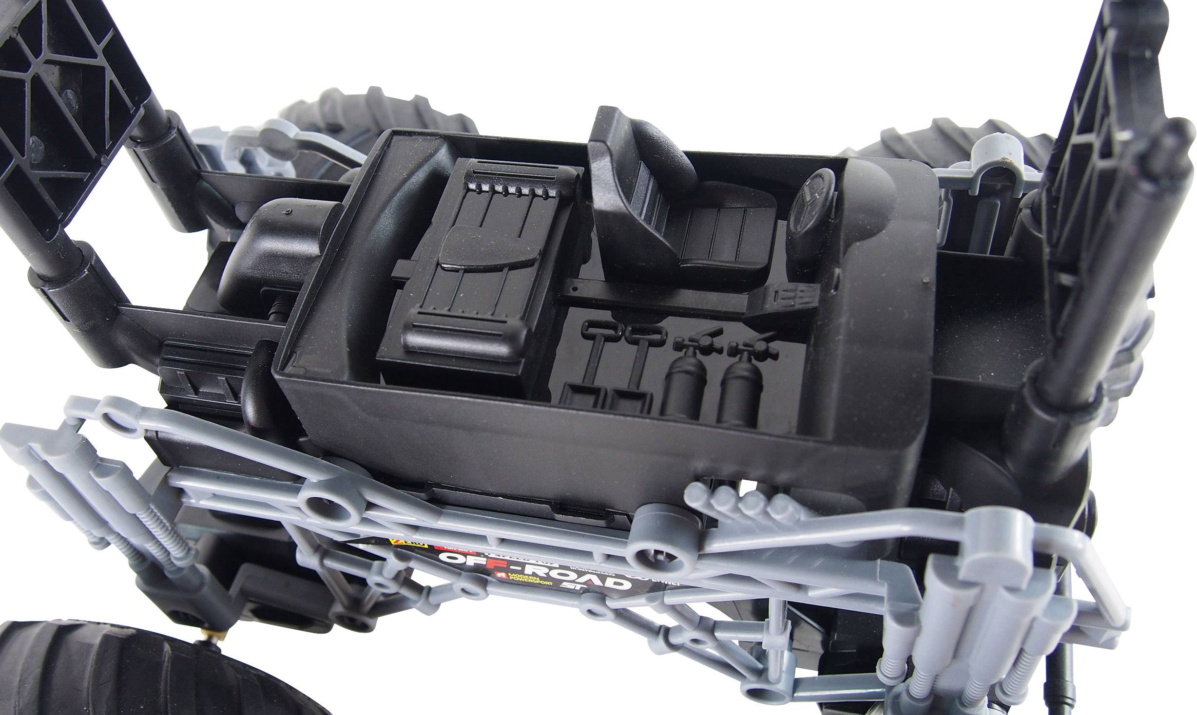 Toy off-road vehicle from above, focusing on the detailed chassis and interior.