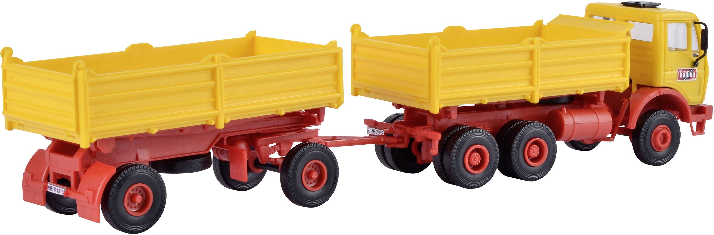 A yellow toy lorry model with a total of eight wheels and a trailer, used for representing goods vehicles in model-making.