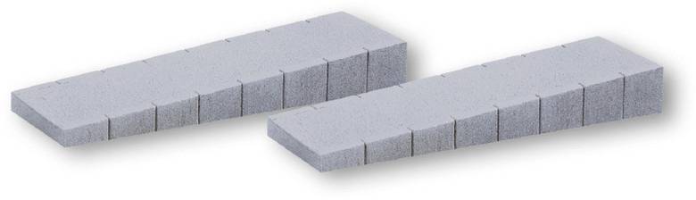 Two grey, rectangular concrete wedge steps with regular joints that can be used to construct ramps.