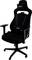 A black gaming chair with adjustable armrests and an ergonomic design. Text on the chair: 'Nitro'.
