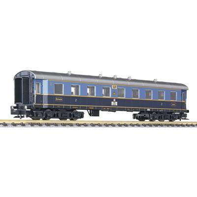 A blue, historic railway passenger carriage on tracks. The carriage has a grey roof, yellow decorative stripes, and multiple windows.
