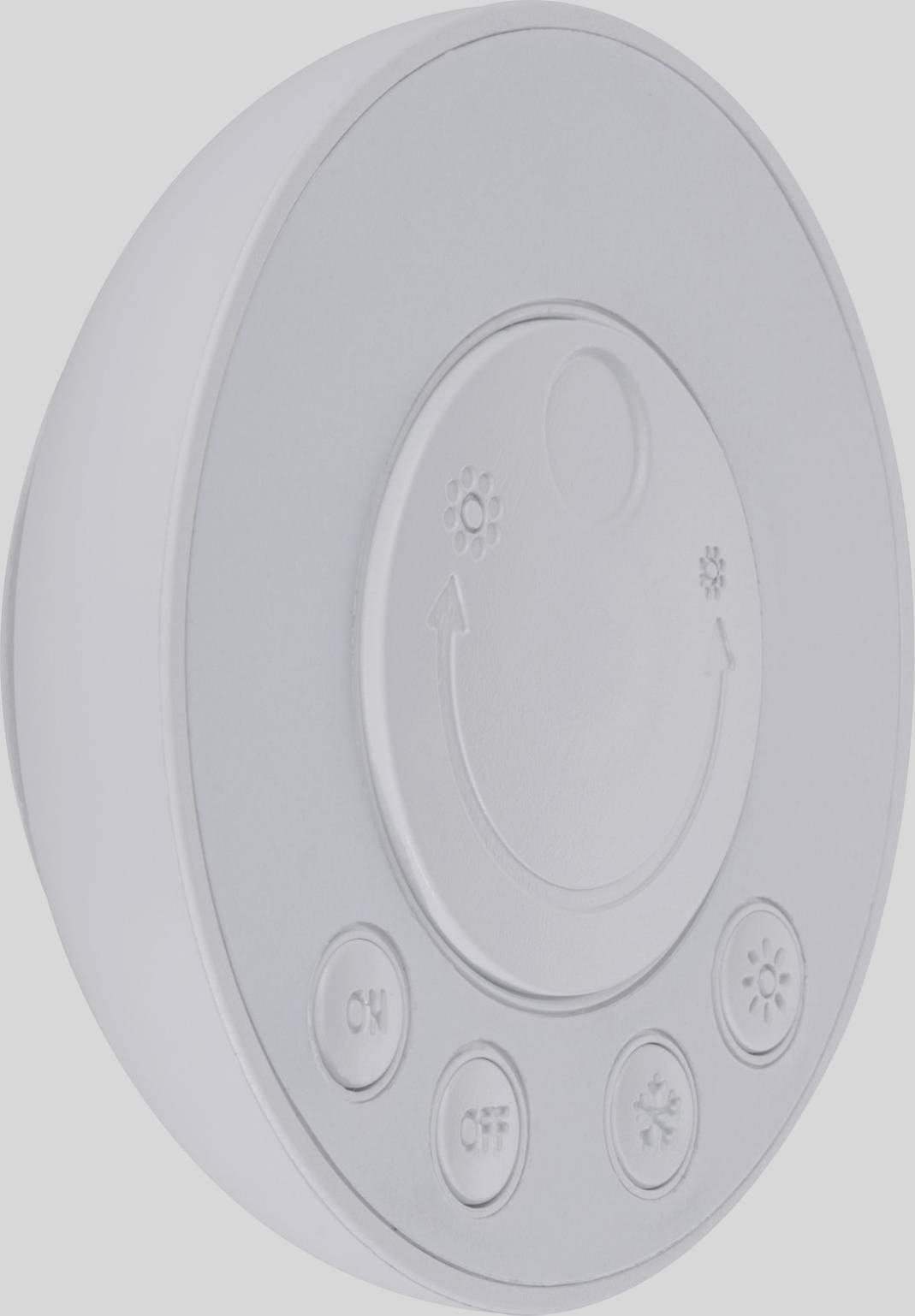Circular remote control with six buttons: 'ON', 'OFF', brightness and temperature control. Predominantly light grey.