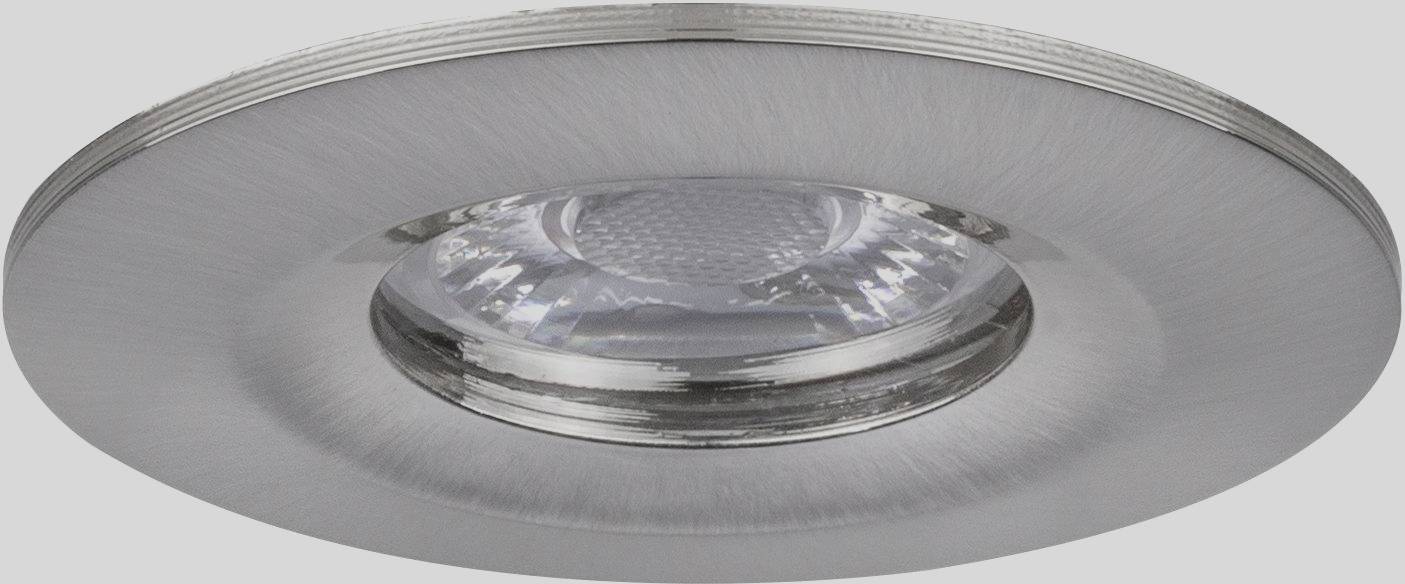 Recessed light fitting with a circular silver frame and clear glass centre, suitable for interior lighting in contemporary spaces.