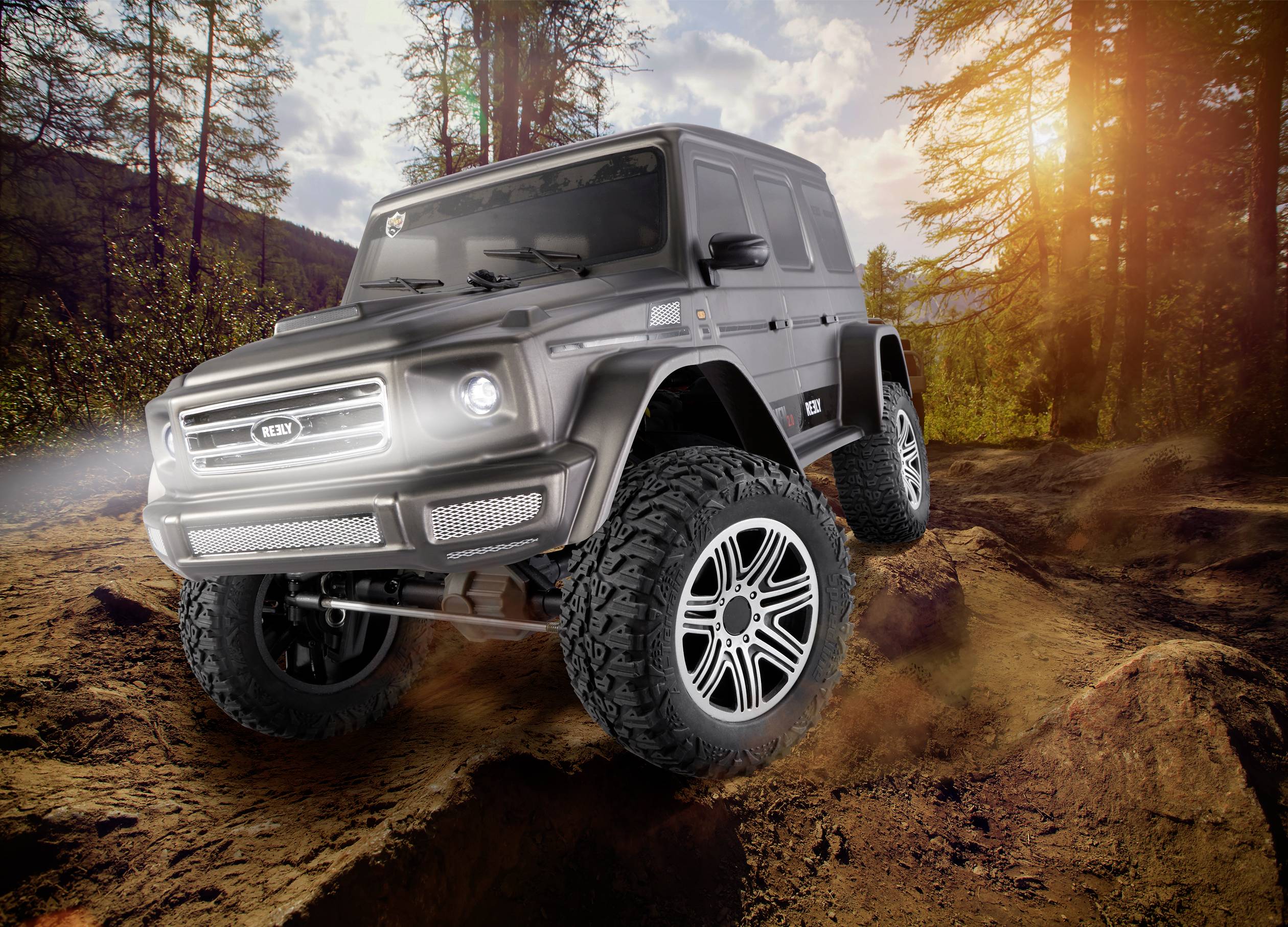 Off-road vehicle on a muddy track in a sun-drenched forest. Large, robust build with gleaming headlamps.