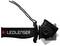 Black LED head torch by Ledlenser with adjustable headband and cable, side view.