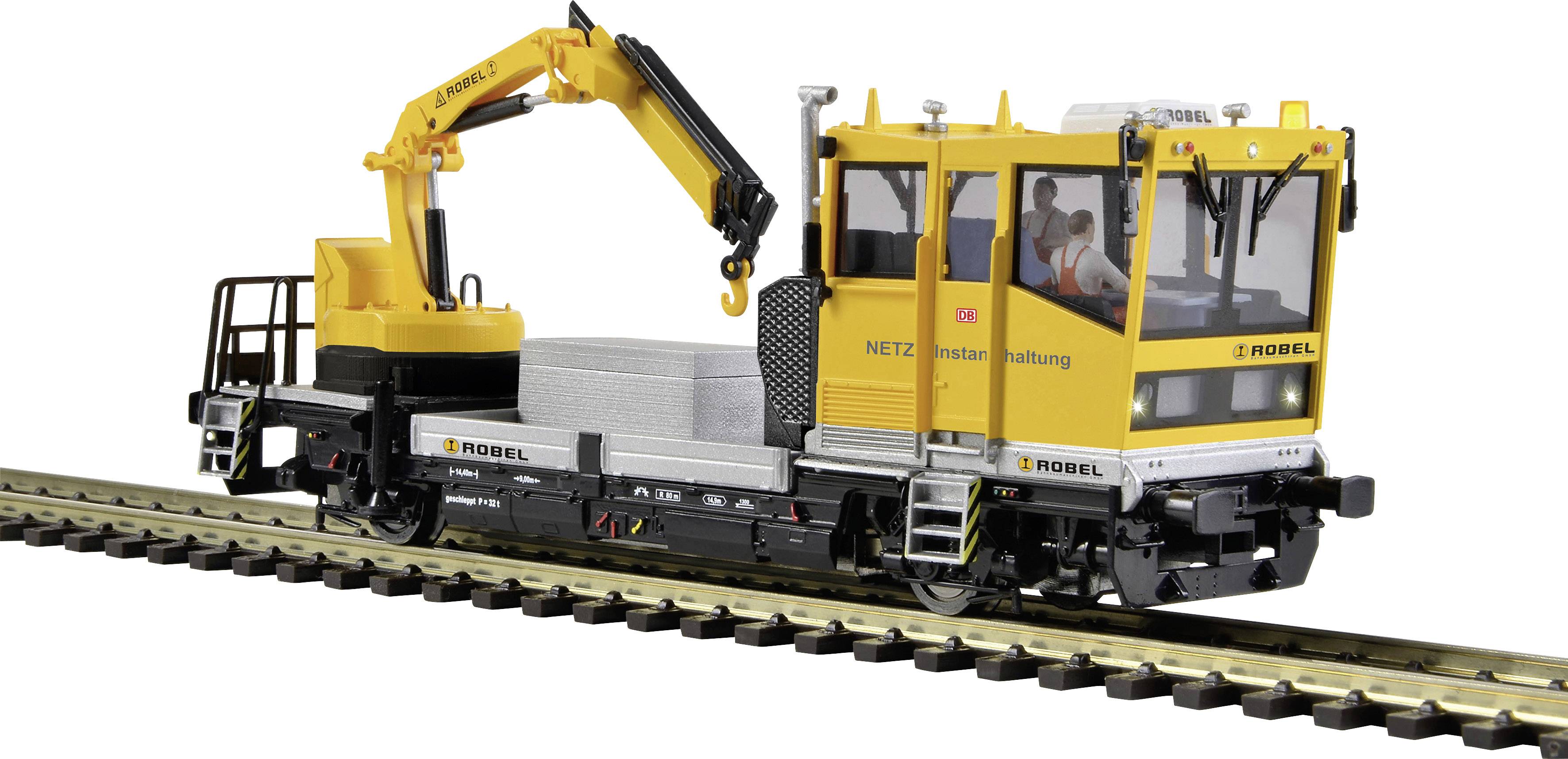 Rail-mounted crane vehicle with a yellow crane arm, used for maintenance and material transportation on railway tracks.