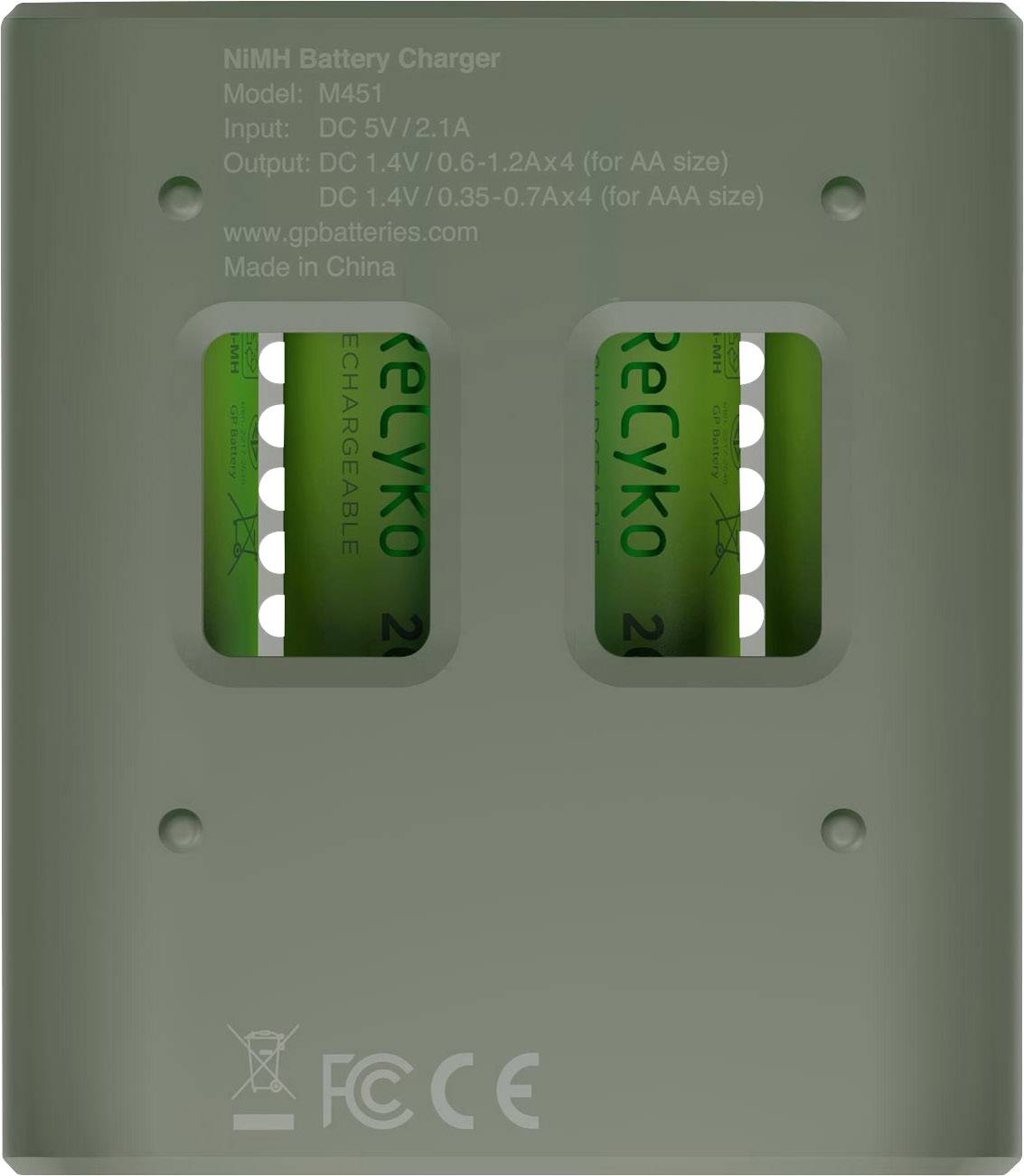 Battery charger with two green AA rechargeable batteries inside. Inscription: 'ReCyko'. Details on model, input, output, and origin.