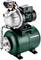 Water pump with green tank and black motor. Used in home installations for pressure boosting. Brand 'Metabo'.