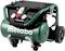 A portable Metabo compressor with two pressure gauges and a large air tank, mounted on wheels for easy mobility.