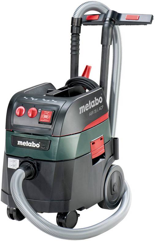Portable Metabo vacuum cleaner with hose, large wheels, and attached handle for workshop cleanup.