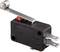 A black microswitch with a metal lever and three terminal clips. The lever has a small wheel at its end.