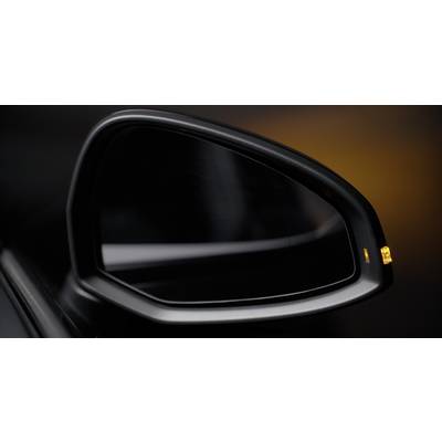 'Car wing mirror with an illuminated warning symbol for the blind spot.'