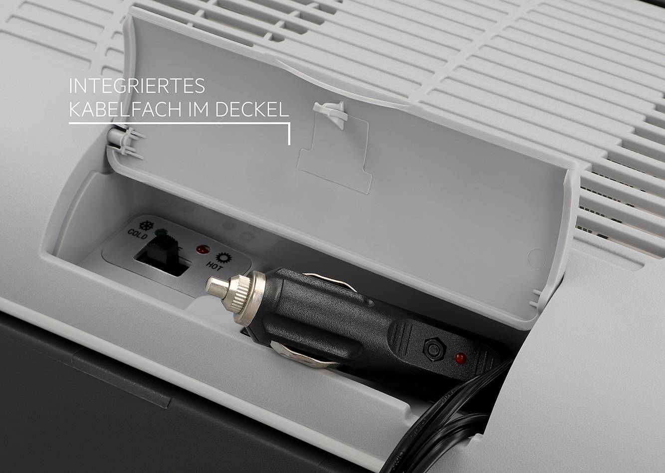 Integrated cable compartment in an electrical device cover, opened, showing a cigarette lighter socket.
