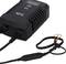 Black AEG battery charger with display and cables, suitable for charging car batteries and other devices.