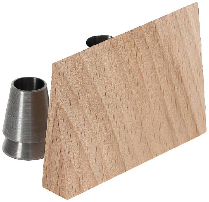 Wooden wedge and two conical metal pieces side by side on a white background. The wooden wedge stands vertically; the metal pieces are lying flat.