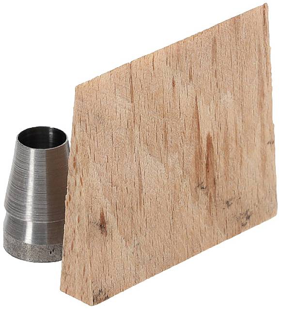 Metal cone next to a rectangular piece of wood standing upright.